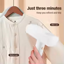 Handheld steam ironing machine